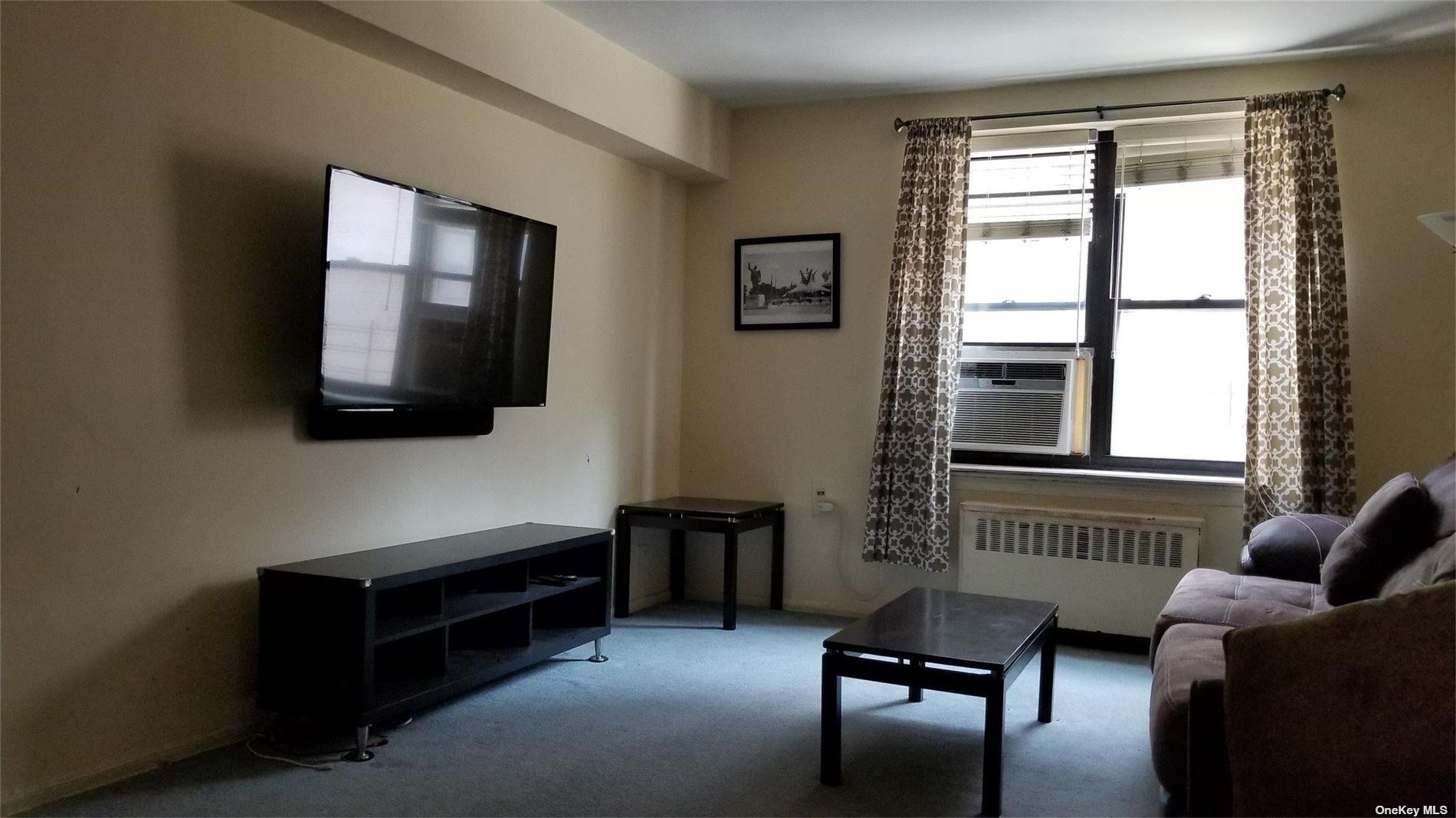 91-10 32 Avenue E204